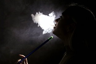 The girl sucks hookah