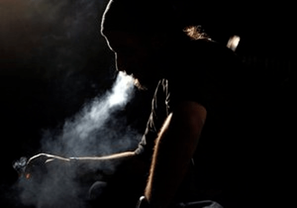 men smoke cigarettes