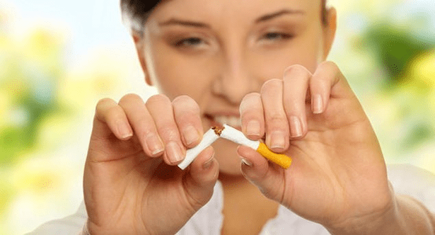 the girl breaks a cigarette and gets rid of the addiction